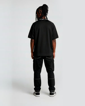 Camisa polo oversized lines preta prison x mavericks