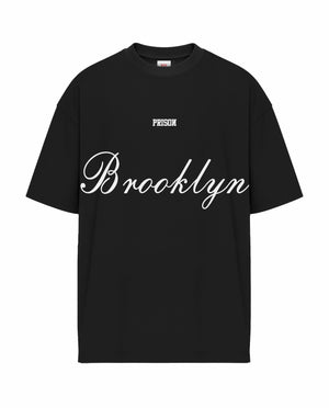 Camiseta oversized preta masculina Brooklyn Lettermark Prison de frente