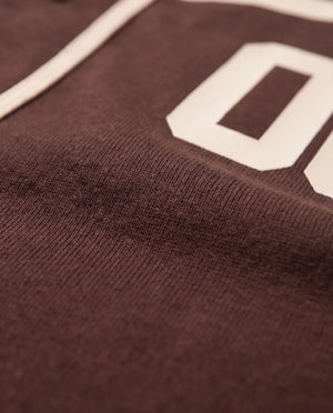 Detalhe do algodão 260g da camisa baseball masculina marrom Prison