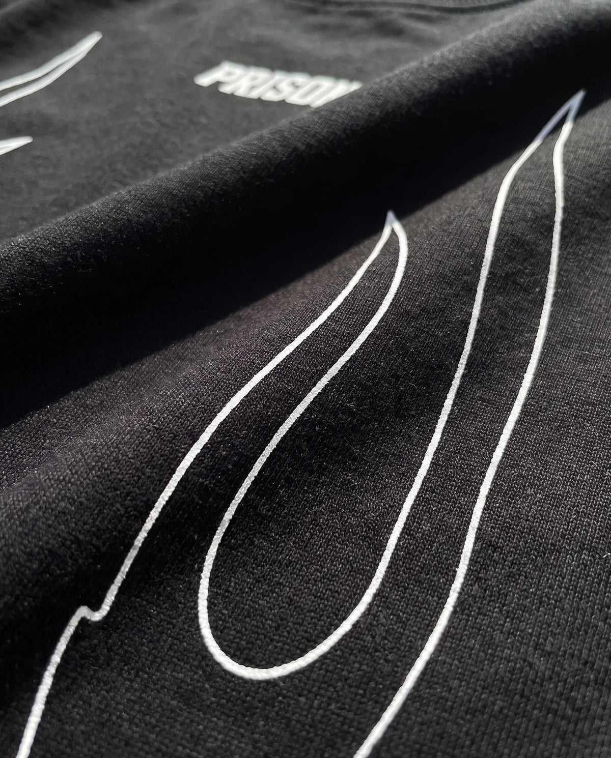 Camiseta Oversized Flame Prison X - Detalhe estampa chamas