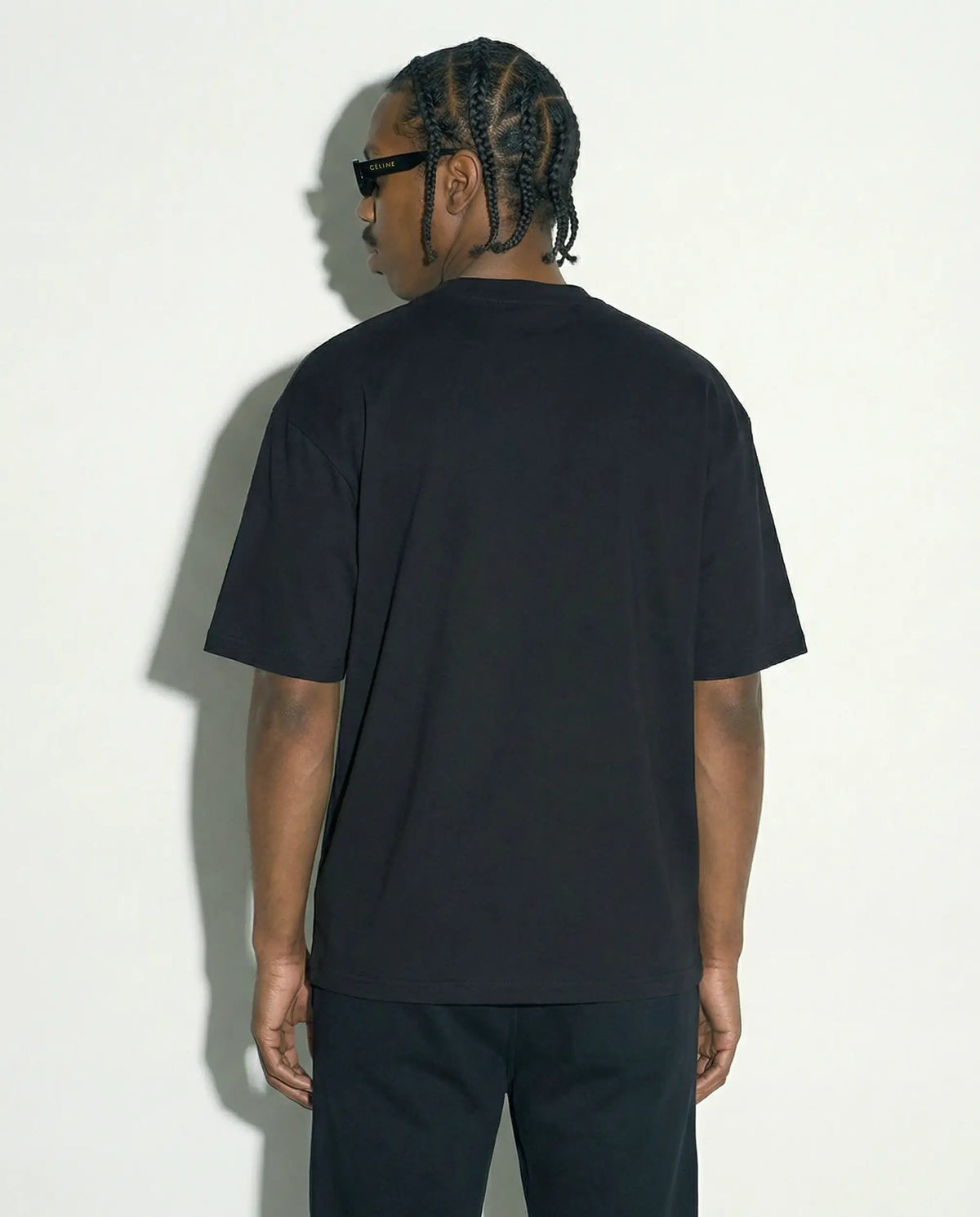 Camiseta oversized NY Kickoff Football preta PRISON® vista das costas