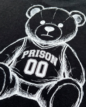 Costas da camiseta oversized Super Bear Prison preta com urso rabiscado vestindo jersey 00.