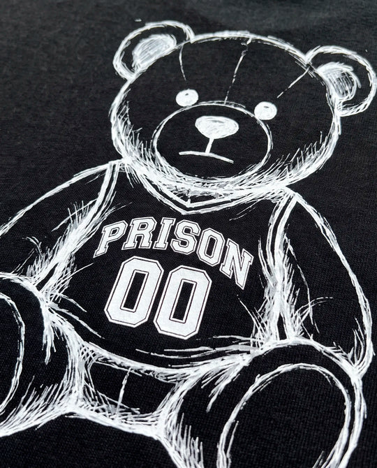 Camiseta oversized Super Bear Prison preta estendida, assinatura em traço fino no peito.