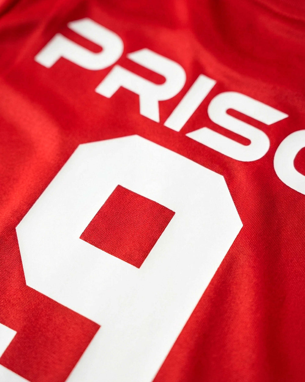 Camiseta futebol americano oversized 9 vermelha prison