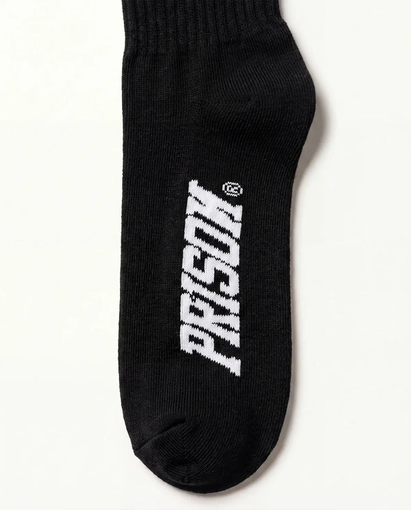 Logo PRISON na sola da meia cano alto masculina preta
