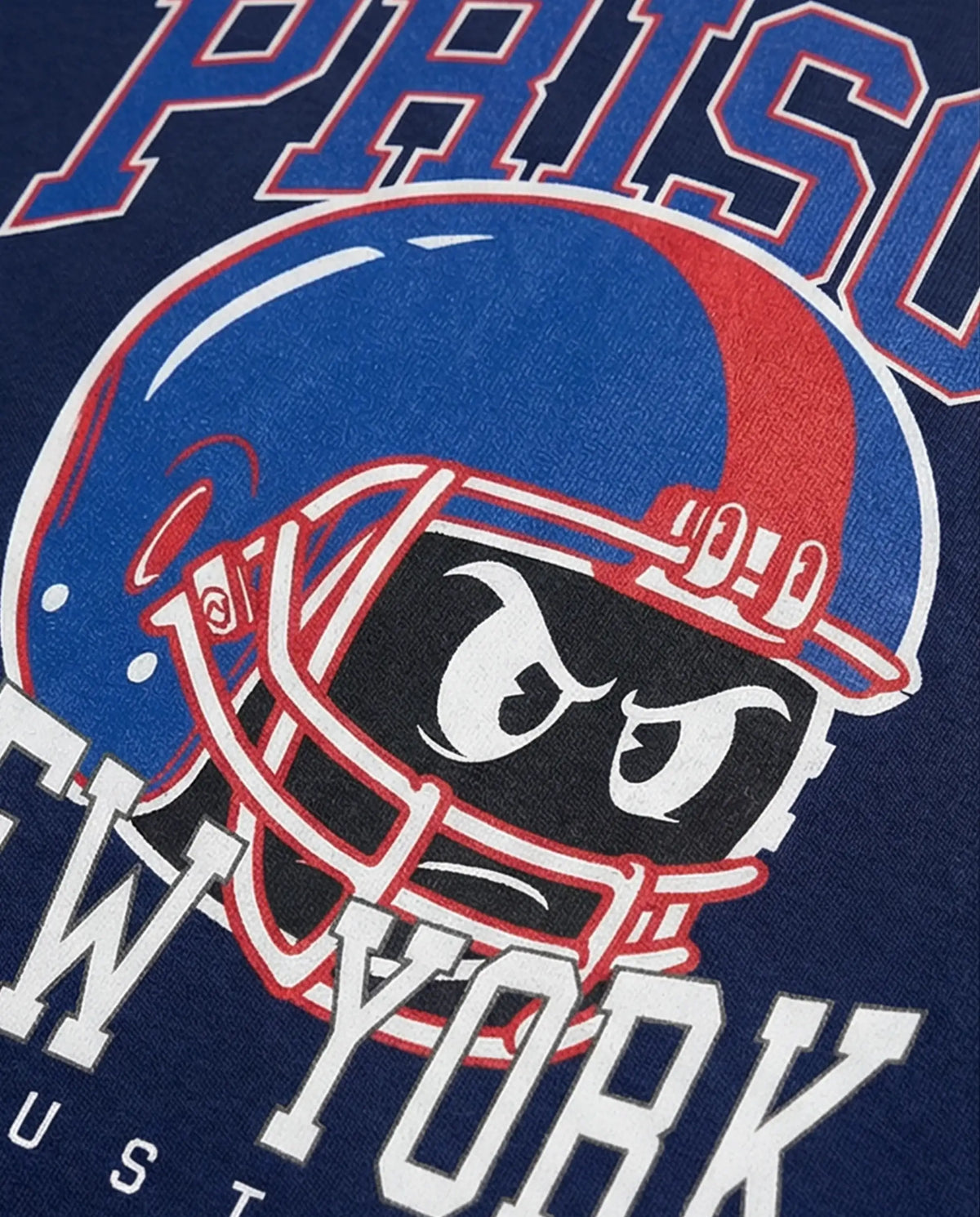 Camiseta oversized NY Kickoff Capacete azul-marinho PRISON® detalhe da estampa
